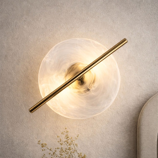 Kinkiet Relax szklany okrągły w kształcie zegara mosiężny LED do salonu 3000K